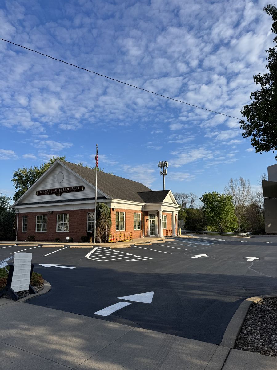 After sealcoating and line striping – credit union parking lot