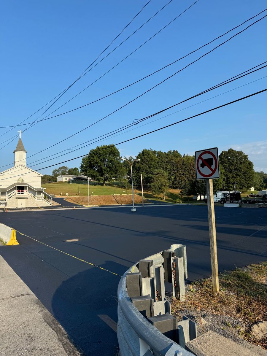 After sealcoating – sealed and striped church parking lot