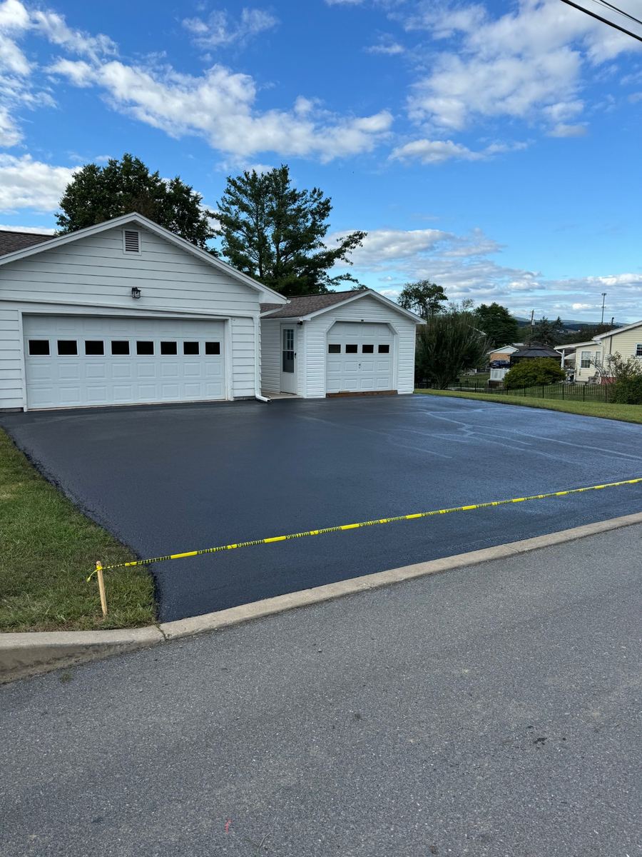 Large residential driveway after professional sealcoating in PA