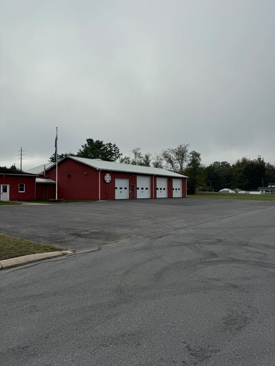 Before sealcoating – weathered fire station parking lot